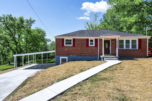 view of front of home with a carport