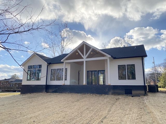 view of front of property featuring cooling unit