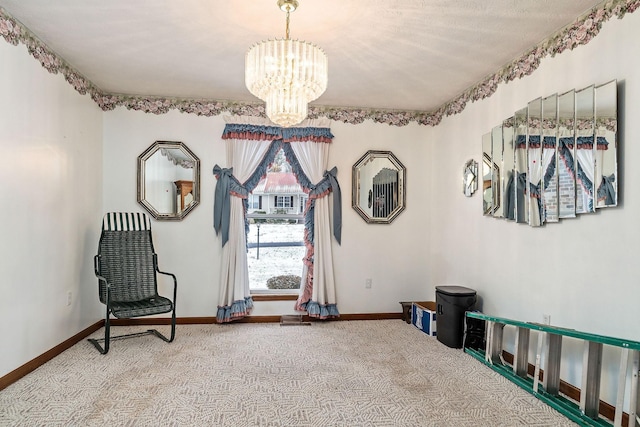 sitting room with light carpet and an inviting chandelier