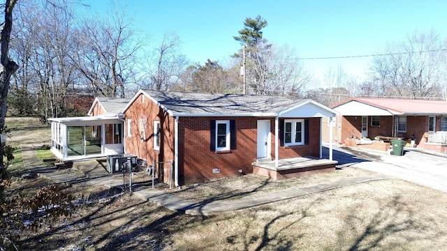 view of front facade featuring a sunroom