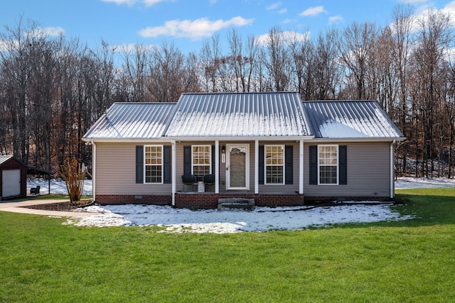 view of front facade with a lawn and a porch