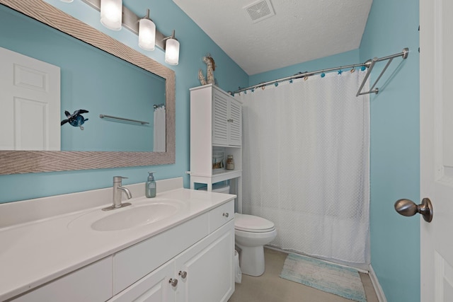 full bathroom with vanity, toilet, shower / tub combo, and a textured ceiling