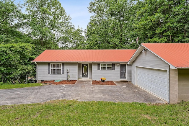 ranch-style house with a front lawn and a garage