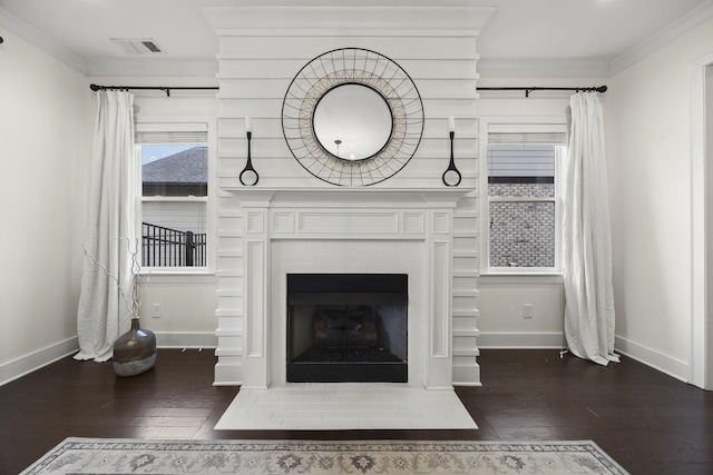 interior details with ornamental molding and wood-type flooring