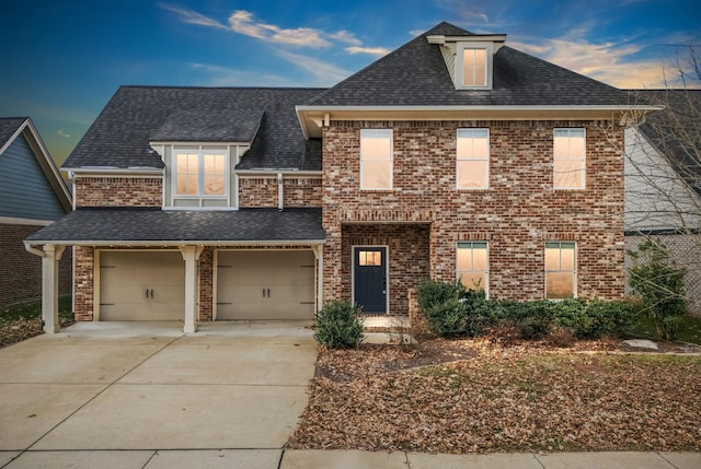 view of front of property featuring a garage