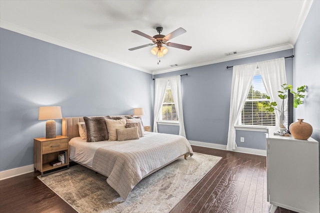 bedroom with dark wood-type flooring, ceiling fan, and ornamental molding