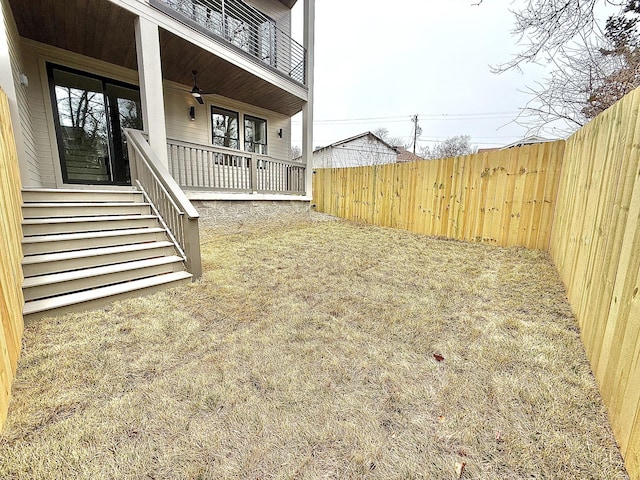 view of yard featuring ceiling fan