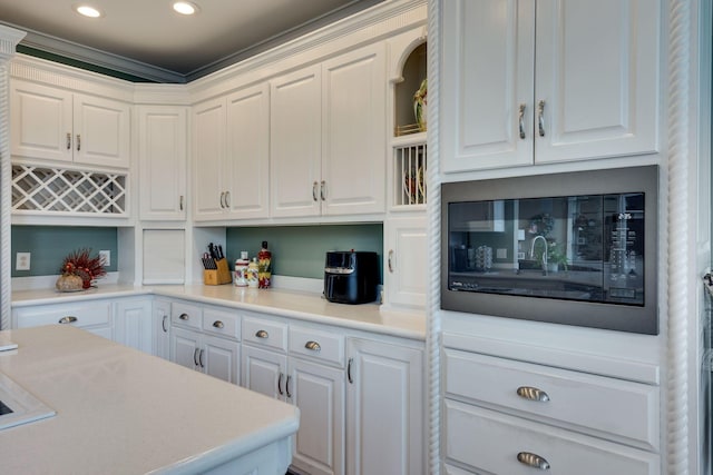 kitchen featuring white cabinetry