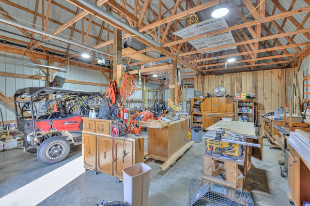 interior space featuring a garage door opener and a workshop area