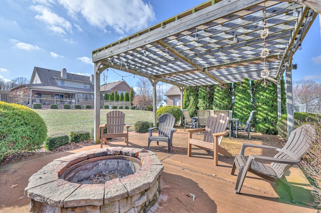 view of patio featuring a fire pit and a pergola