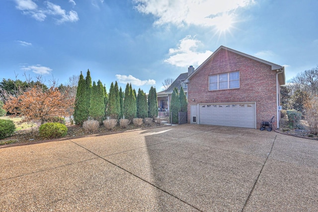 view of side of property featuring a garage