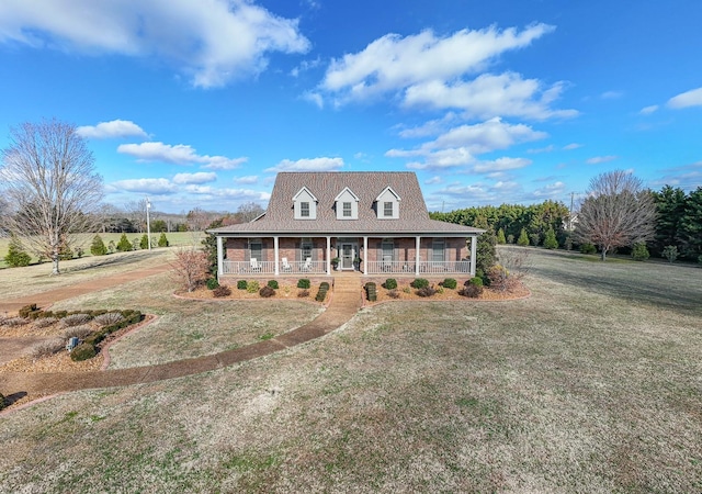 farmhouse-style home with a porch and a front yard