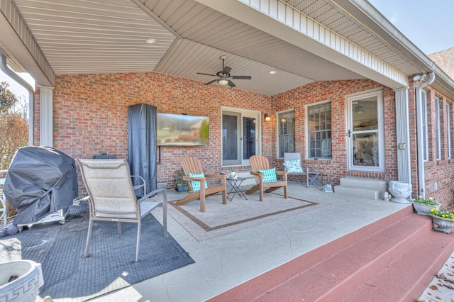 view of patio featuring grilling area and ceiling fan