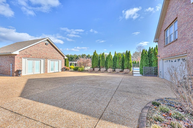 view of property exterior with a garage