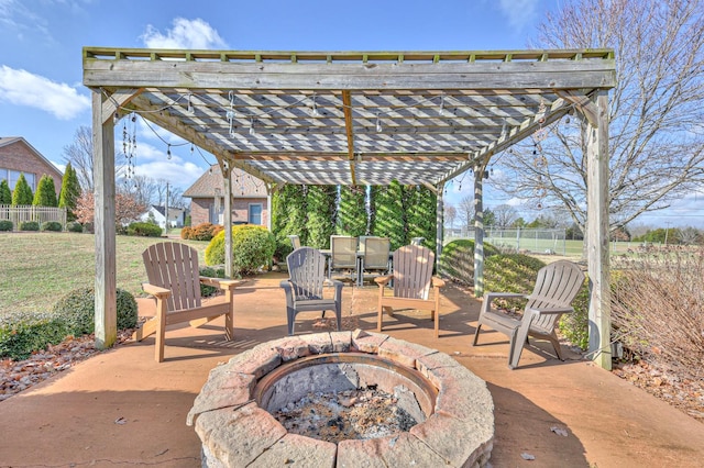 view of patio / terrace featuring a fire pit and a pergola