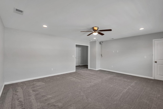 carpeted empty room featuring ceiling fan