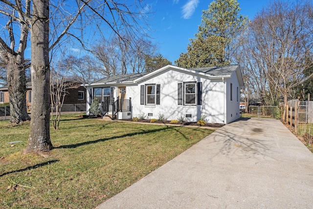 ranch-style home with a front yard