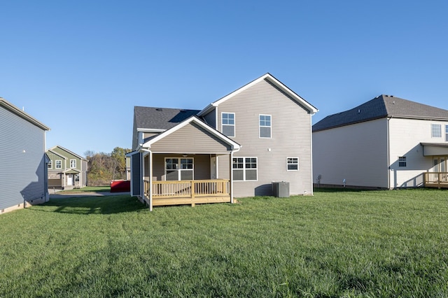 back of house with a yard