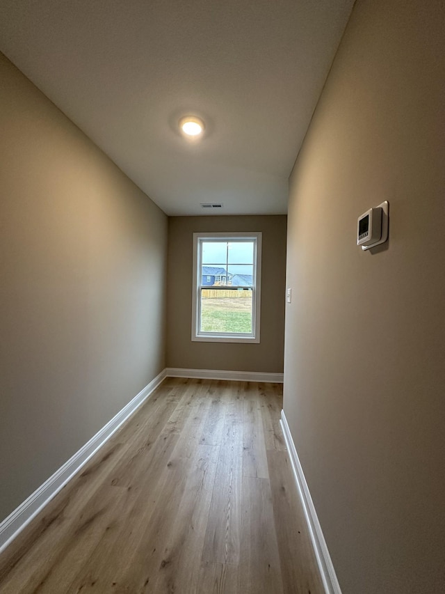 empty room featuring light hardwood / wood-style floors