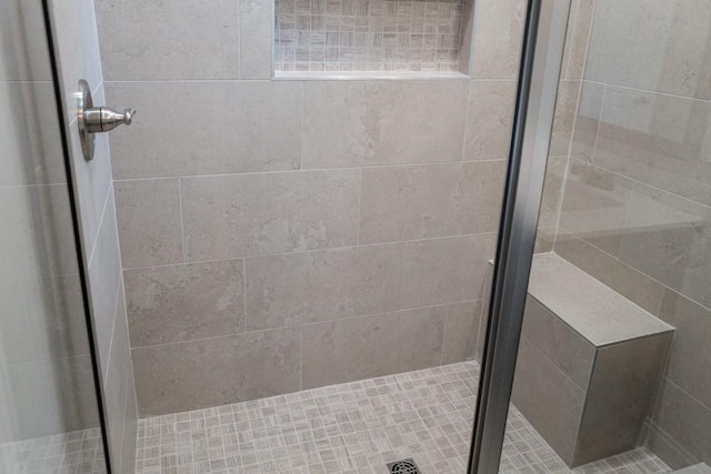 bathroom with an enclosed shower