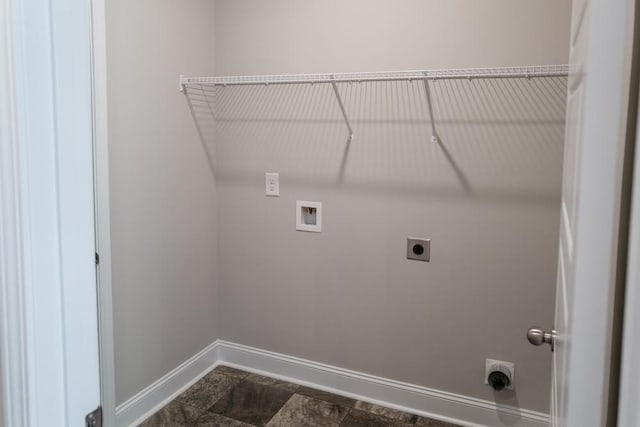 clothes washing area with washer hookup and hookup for an electric dryer