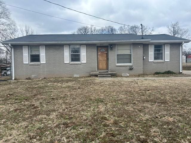 single story home featuring a front yard