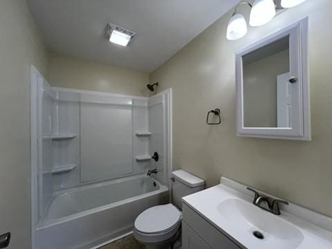 full bathroom with toilet, vanity, and bathing tub / shower combination