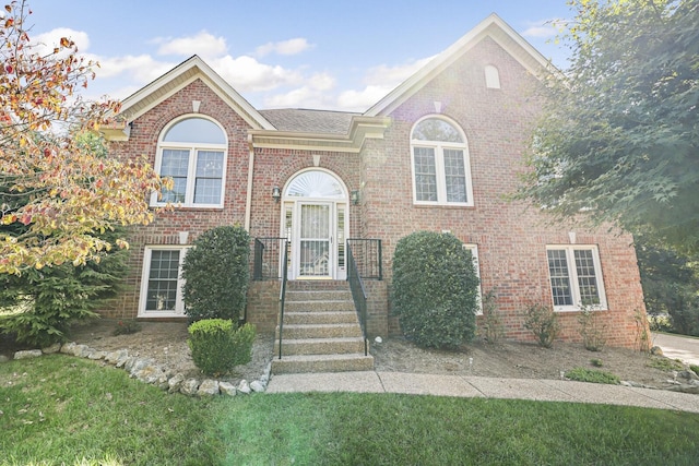 view of front of home with a front yard