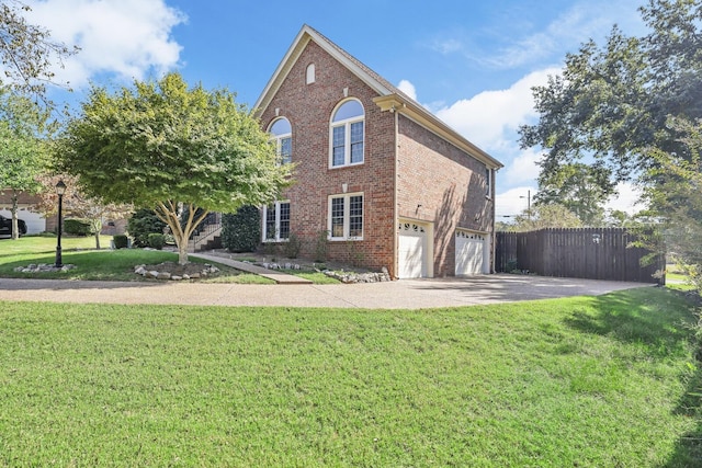 exterior space with a yard and a garage