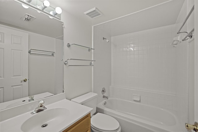 full bathroom featuring toilet, vanity, and tub / shower combination