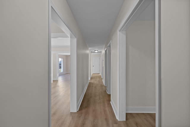 hall featuring light hardwood / wood-style floors