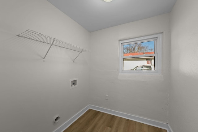 laundry room featuring washer hookup and wood-type flooring