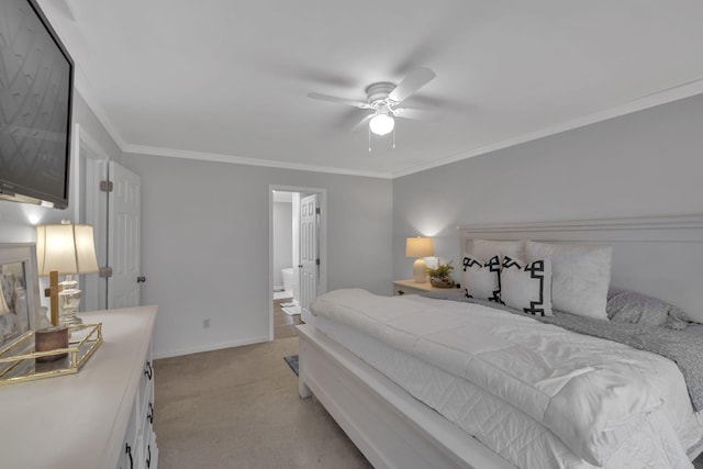 carpeted bedroom featuring ceiling fan and crown molding