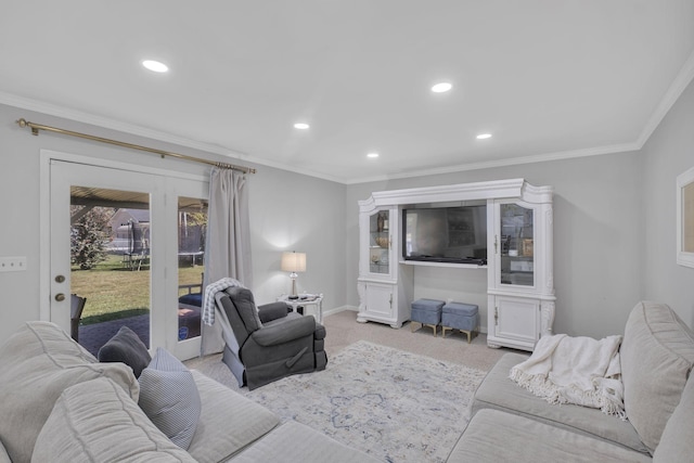 living room with light carpet and crown molding