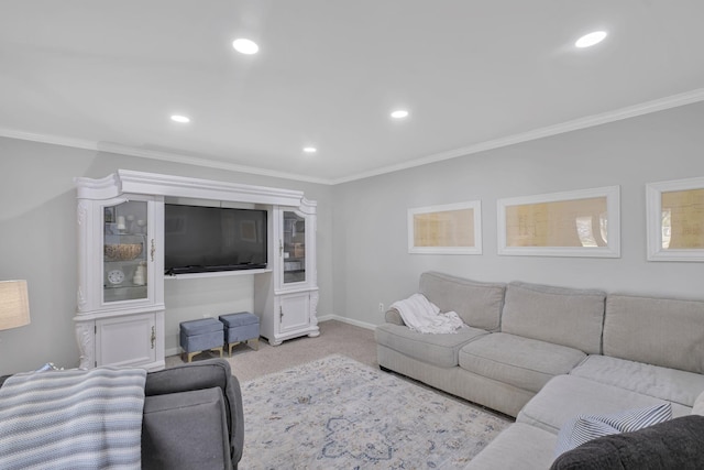 carpeted living room featuring ornamental molding