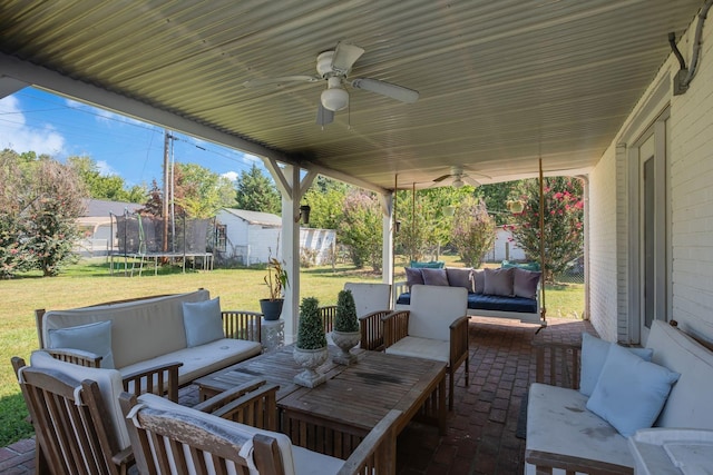 view of patio / terrace featuring ceiling fan, outdoor lounge area, and a trampoline