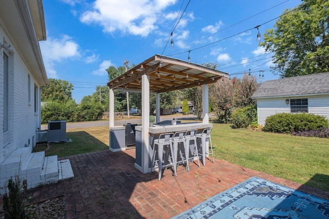 view of patio / terrace featuring an outdoor bar