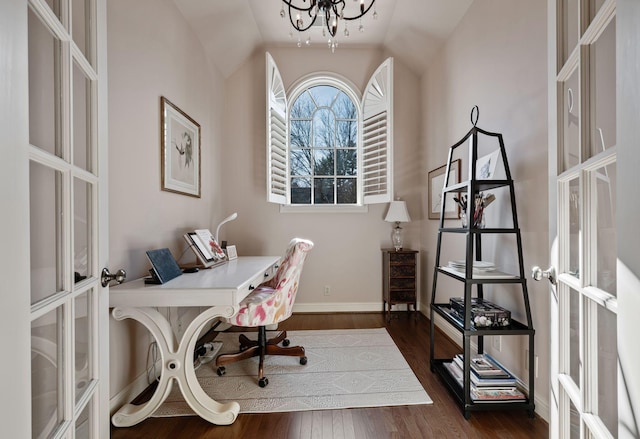 office with french doors, dark hardwood / wood-style floors, a notable chandelier, and vaulted ceiling