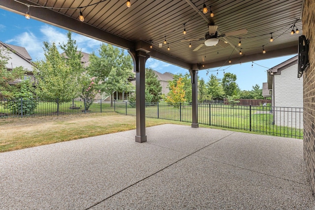 view of patio featuring ceiling fan