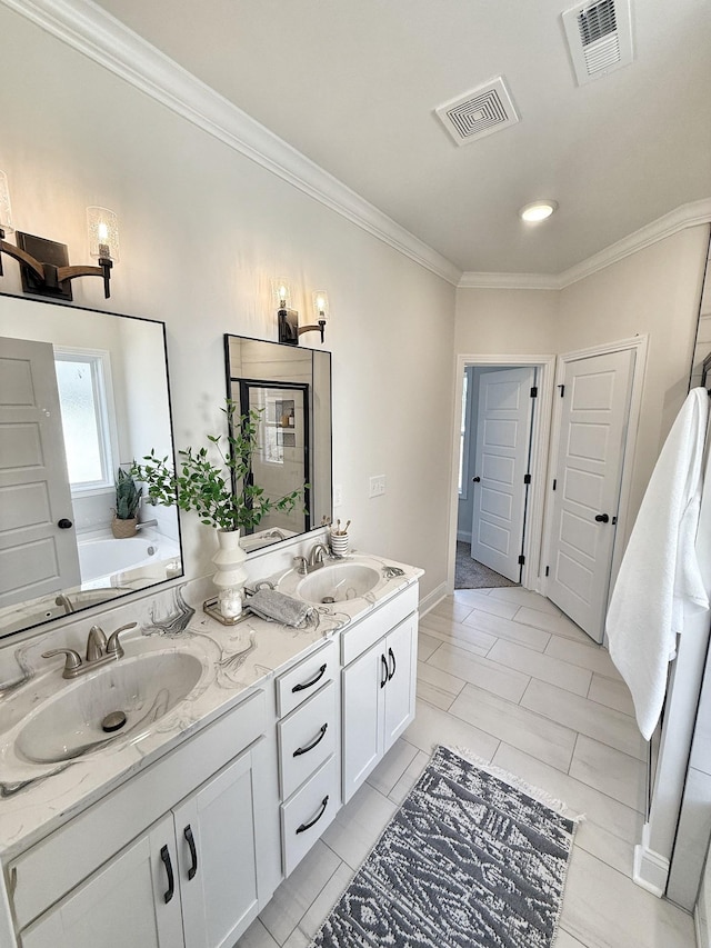 308 Griffey Ests, Clarksville, TN 37042 - bathroom featuring crown molding, a sink, visible vents, and double vanity