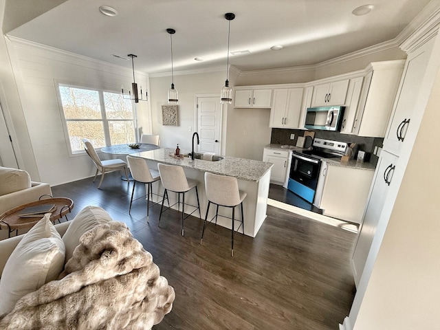 308 Griffey Ests, Clarksville, TN 37042 - kitchen featuring stainless steel appliances, dark wood-style flooring, a sink, and crown molding