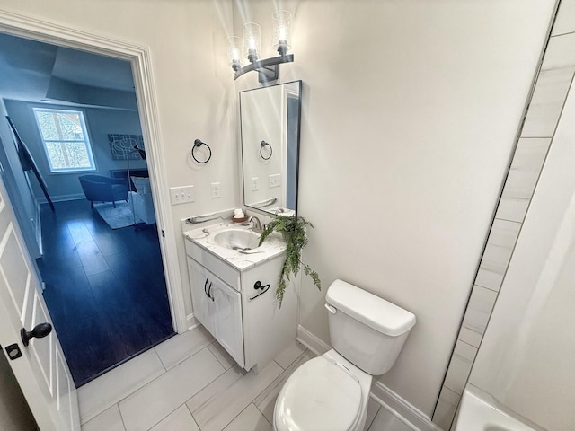 308 Griffey Ests, Clarksville, TN 37042 - bathroom featuring tile patterned floors, baseboards, vanity, and toilet