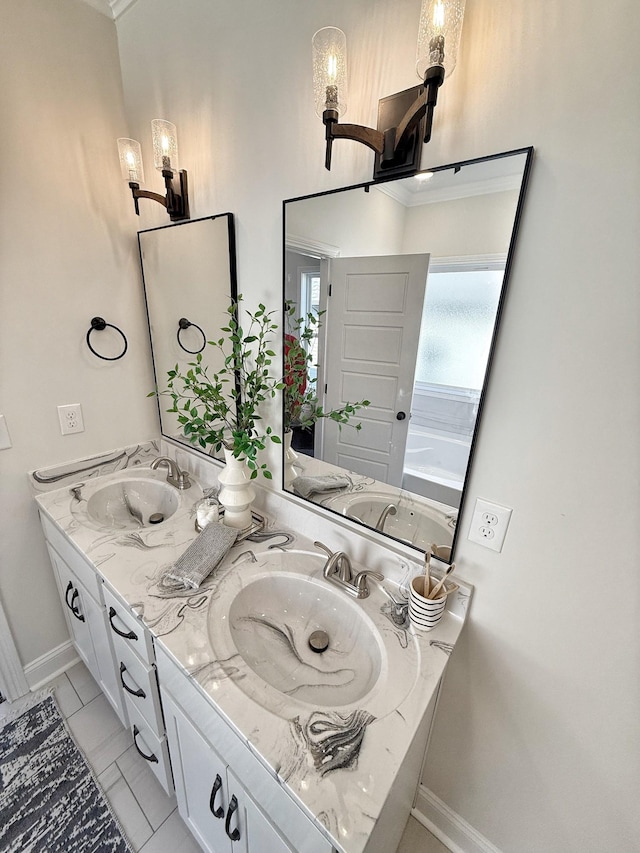 308 Griffey Ests, Clarksville, TN 37042 - bathroom featuring baseboards, a sink, and double vanity