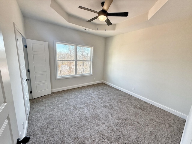 308 Griffey Ests, Clarksville, TN 37042 - spare room featuring a ceiling fan, carpet, a raised ceiling, baseboards, and visible vents