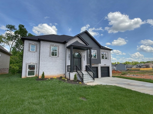 308 Griffey Ests, Clarksville, TN 37042 - view of front of property featuring brick siding, an attached garage, a front lawn, and concrete driveway