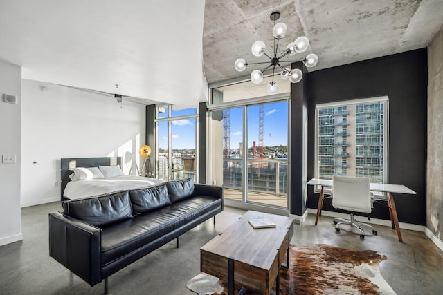 bedroom featuring a notable chandelier, floor to ceiling windows, and concrete flooring