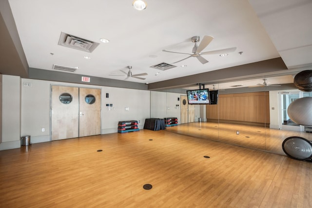 workout area featuring light hardwood / wood-style floors