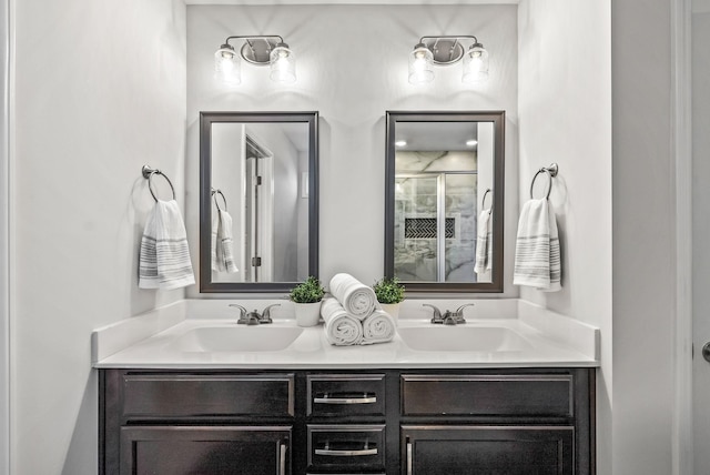 bathroom with an enclosed shower and vanity