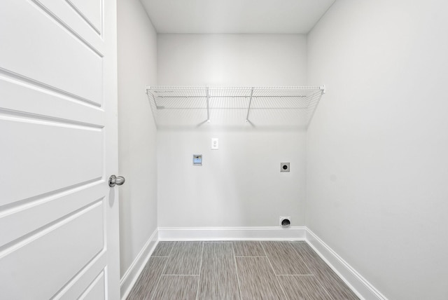 laundry area with hookup for a washing machine and hookup for an electric dryer