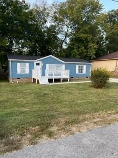 view of front of house with a front yard